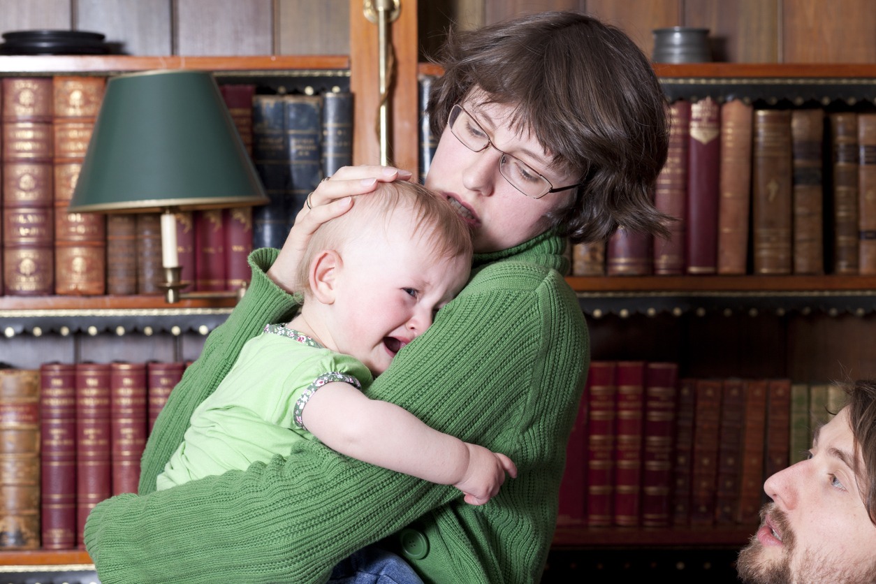 young-parents-with-a-crying-baby