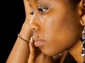 black woman sad - crying