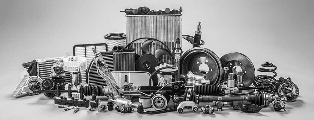 aftermarket parts in black and white photo