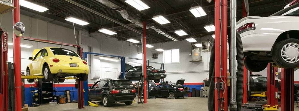 Autobody shop with cars elevated