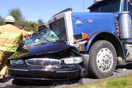 Truck crushes in to blue car - Truck accidents