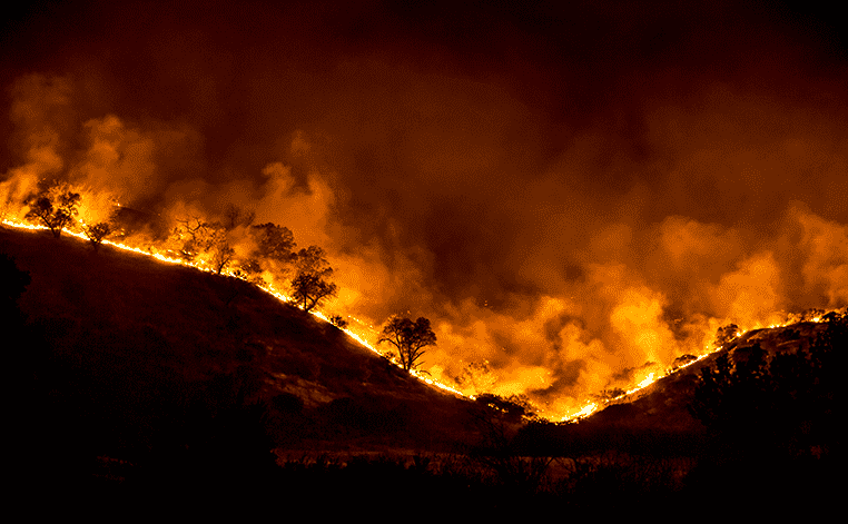 Woolsey Fire Lawsuits - Fire over CA mountain