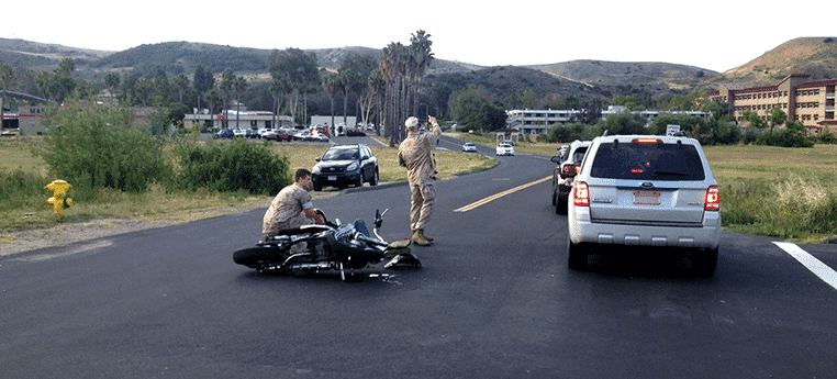 Officers at the site of a motorcycle accident