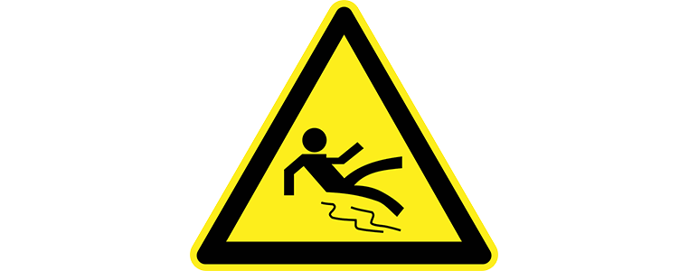 Yellow triangle slip and fall sign