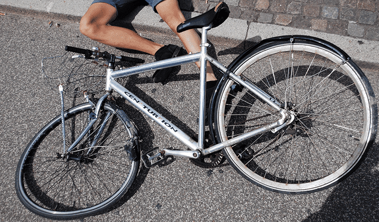 Man fallen over after being in a bicycle accident