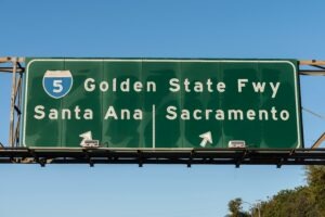 Closeup of a freeway sign leading to Interstate 5.