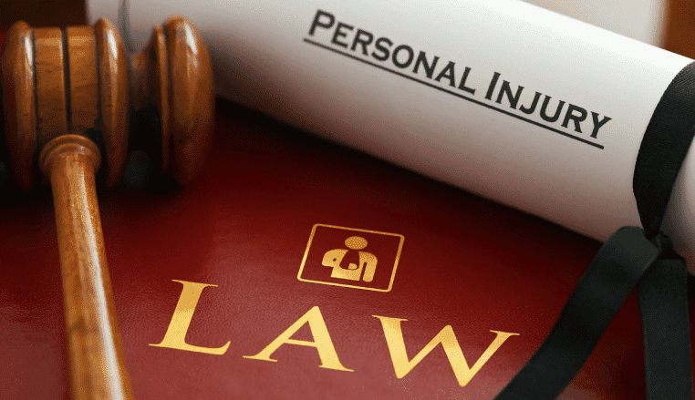 Personal Injury Law book and gavel
