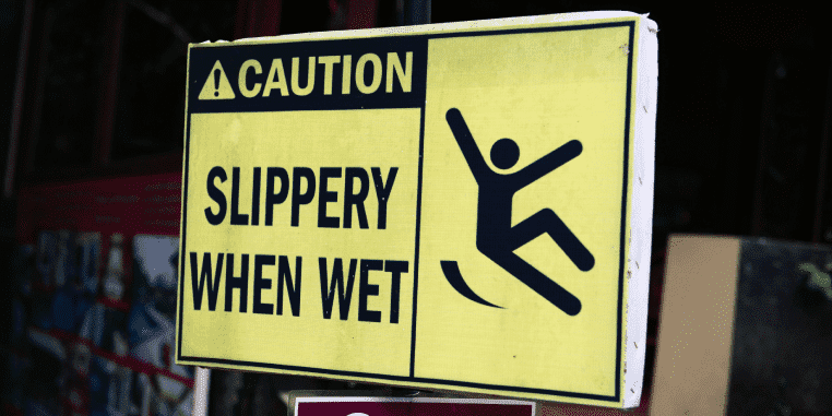 "Slippery When Wet Caution Sign"