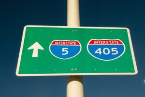 A green "Interstate 5" freeway sign.