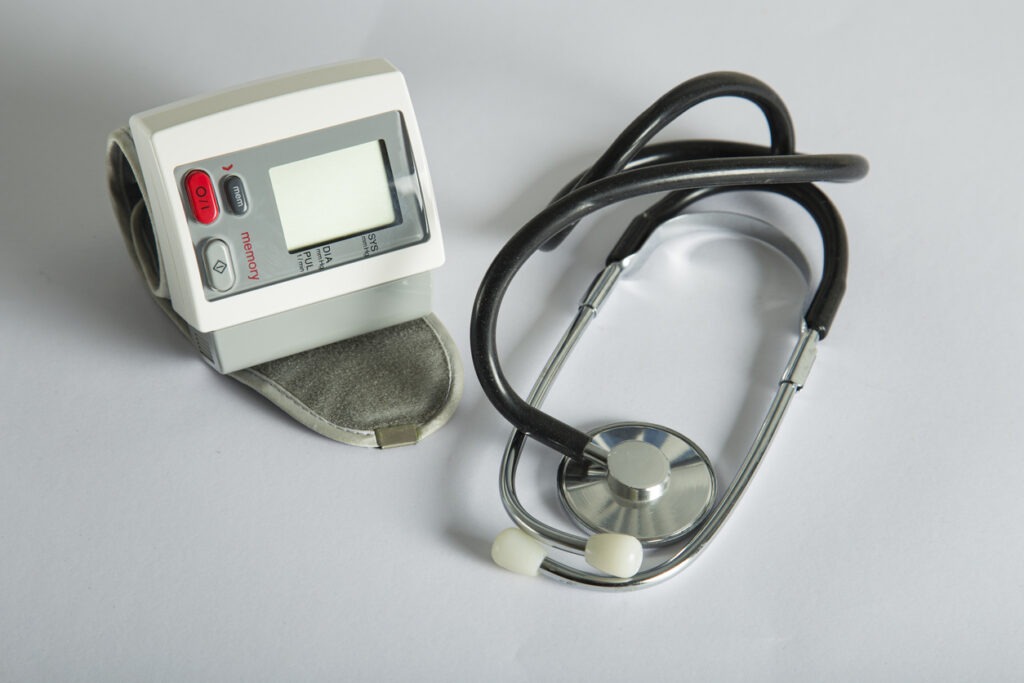 A picture of a stethoscope on a white surface.