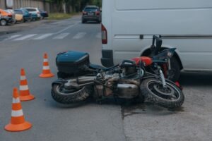 Motorcycle on the concrete after an accident.