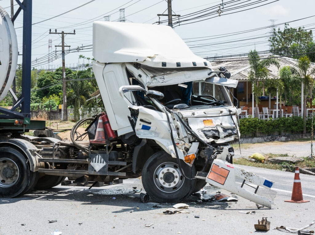 A truck completely totaled after an accident.