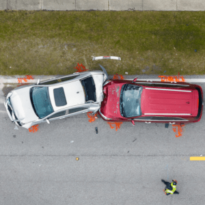 A red and white car in a rear-end accident.